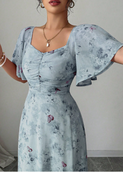 Picture of Modelyn women's chiffon summer dress with butterfly pattern